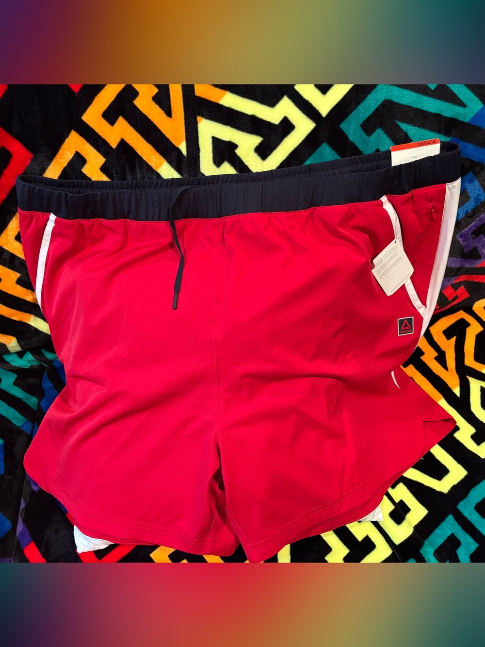 Reebok Red Athletic Shorts with Black Waistband and White Trim